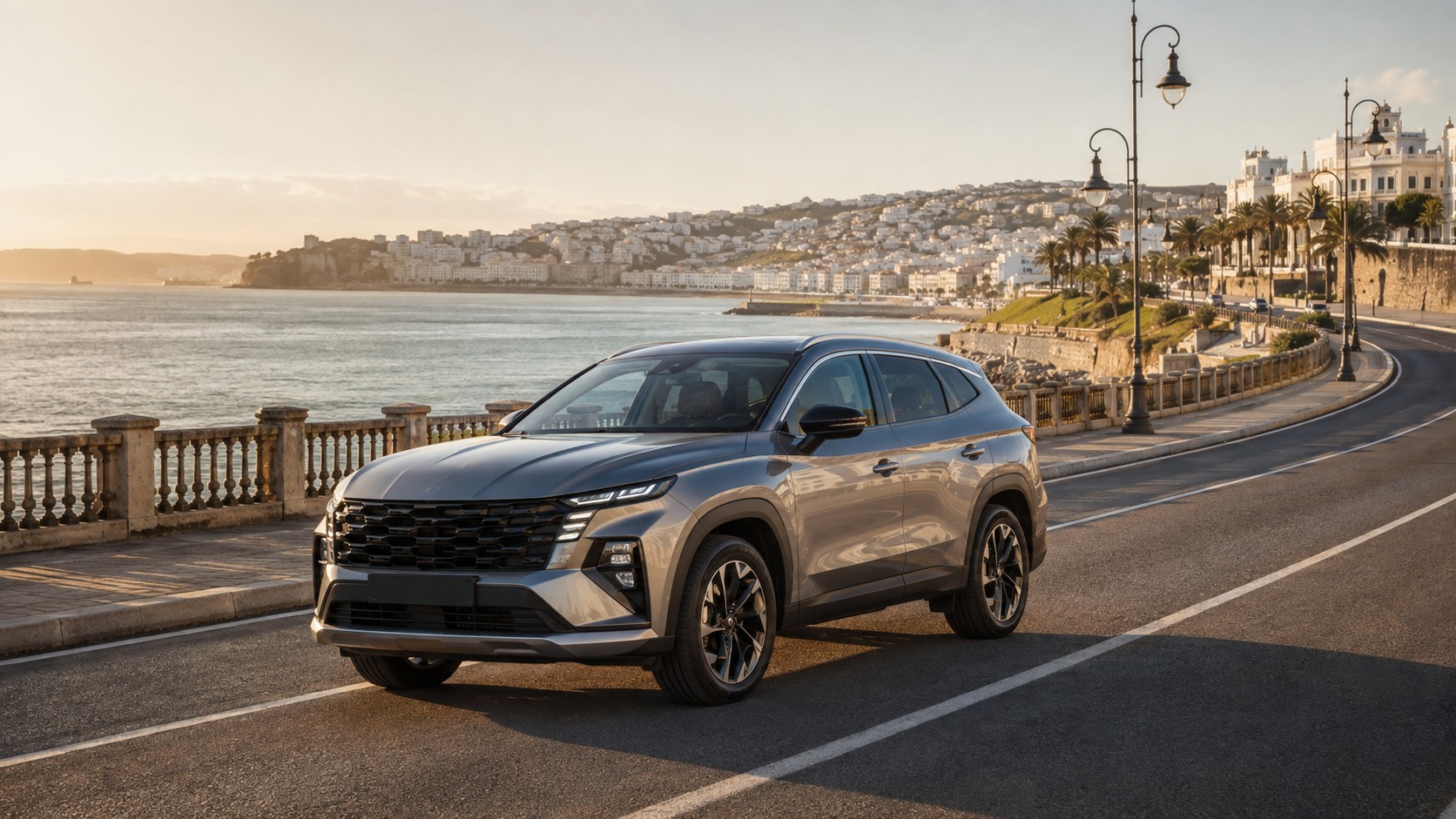SUV hybride de location sur une route côtière de Tanger au coucher du soleil